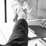 business-meeting-agreement-handshake-concept-hand-holding-after-finishing-up-dealing-project-or_t20_XxxnLR